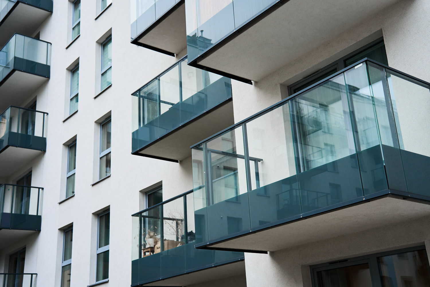 Residential building facade with balconies and windows